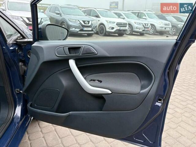 Синий Форд Фиеста, объемом двигателя 1.4 л и пробегом 240 тыс. км за 6190 $, фото 26 на Automoto.ua