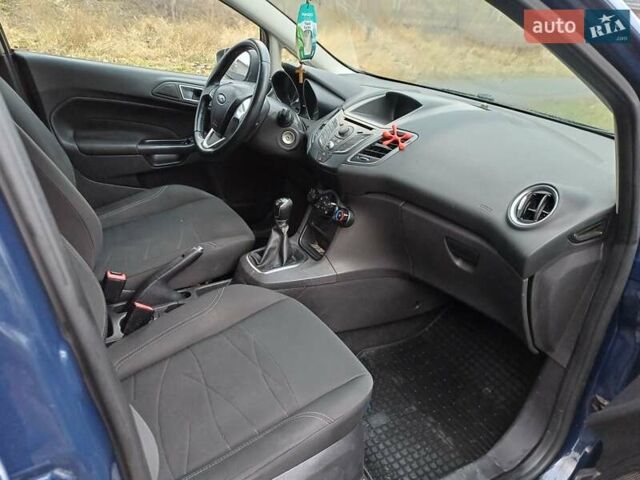 Синий Форд Фиеста, объемом двигателя 1 л и пробегом 152 тыс. км за 4900 $, фото 5 на Automoto.ua