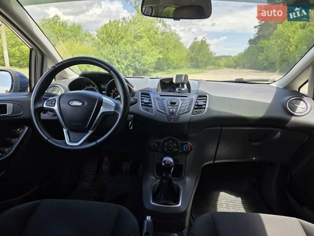 Синий Форд Фиеста, объемом двигателя 1 л и пробегом 85 тыс. км за 7300 $, фото 10 на Automoto.ua