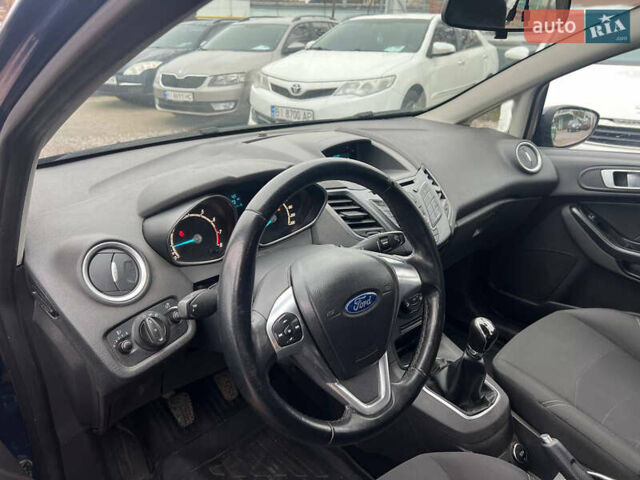 Синій Форд Фієста, об'ємом двигуна 1 л та пробігом 109 тис. км за 6200 $, фото 13 на Automoto.ua