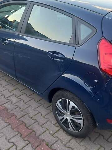 Синий Форд Фиеста, объемом двигателя 1 л и пробегом 240 тыс. км за 4650 $, фото 4 на Automoto.ua