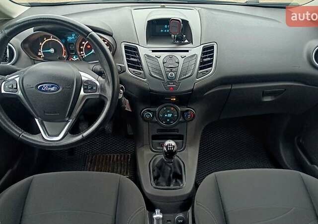 Синій Форд Фієста, об'ємом двигуна 1 л та пробігом 157 тис. км за 7098 $, фото 7 на Automoto.ua