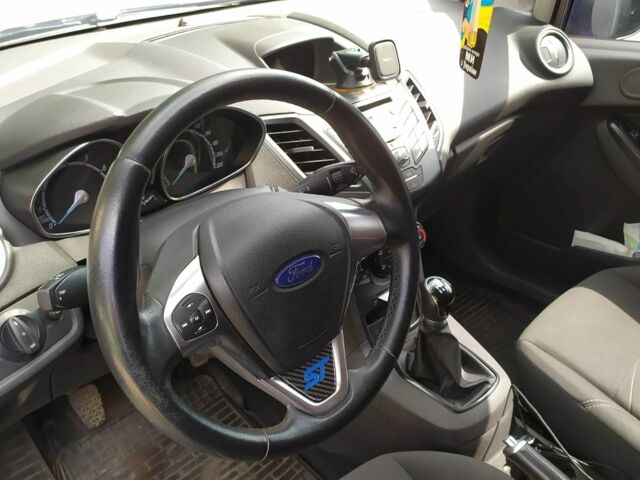 Синий Форд Фиеста, объемом двигателя 1 л и пробегом 77 тыс. км за 7750 $, фото 9 на Automoto.ua