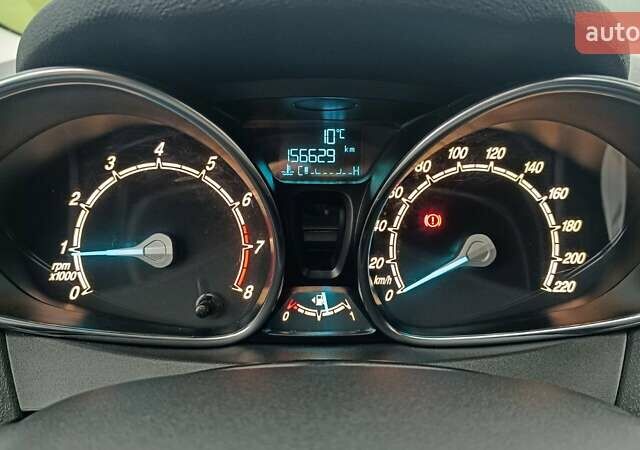 Синій Форд Фієста, об'ємом двигуна 1 л та пробігом 157 тис. км за 7098 $, фото 13 на Automoto.ua