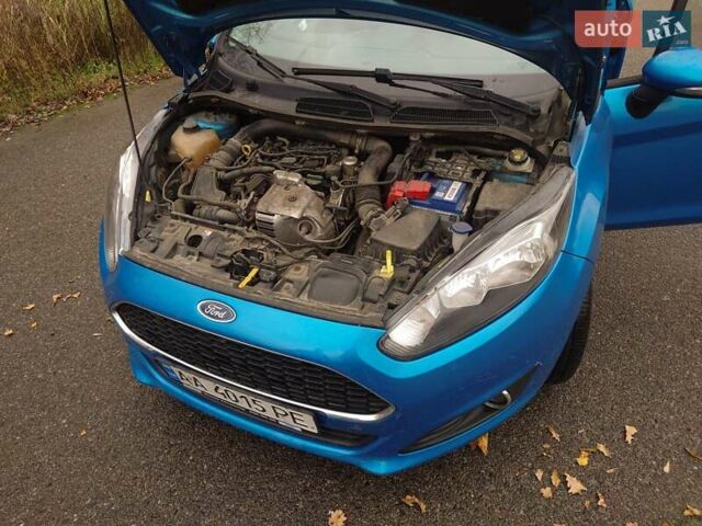 Синий Форд Фиеста, объемом двигателя 1 л и пробегом 86 тыс. км за 9700 $, фото 13 на Automoto.ua