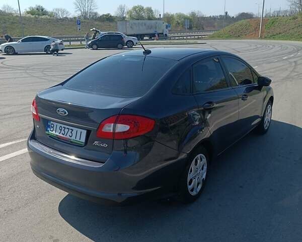 Синий Форд Фиеста, объемом двигателя 1.6 л и пробегом 98 тыс. км за 6100 $, фото 11 на Automoto.ua