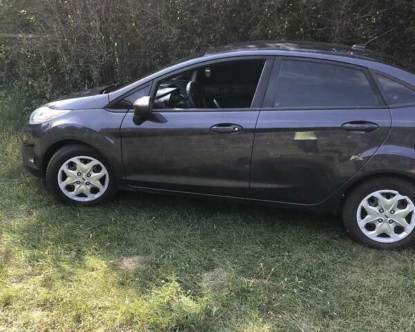 Синий Форд Фиеста, объемом двигателя 1.6 л и пробегом 183 тыс. км за 6500 $, фото 1 на Automoto.ua