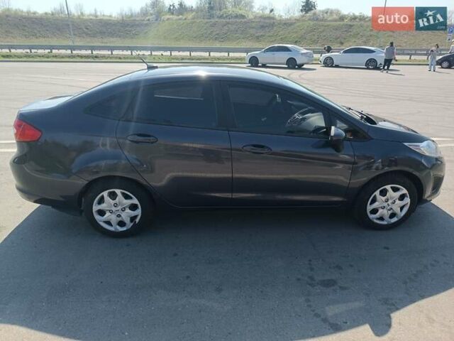 Синий Форд Фиеста, объемом двигателя 1.6 л и пробегом 98 тыс. км за 6100 $, фото 1 на Automoto.ua