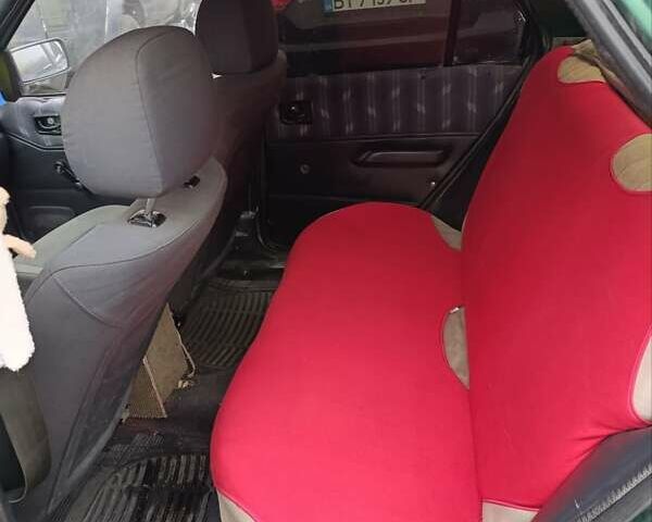 Зеленый Форд Фиеста, объемом двигателя 1.3 л и пробегом 300 тыс. км за 850 $, фото 5 на Automoto.ua