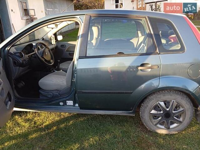 Зеленый Форд Фиеста, объемом двигателя 1.39 л и пробегом 221 тыс. км за 3300 $, фото 1 на Automoto.ua