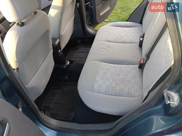 Зеленый Форд Фиеста, объемом двигателя 1.39 л и пробегом 221 тыс. км за 3300 $, фото 9 на Automoto.ua