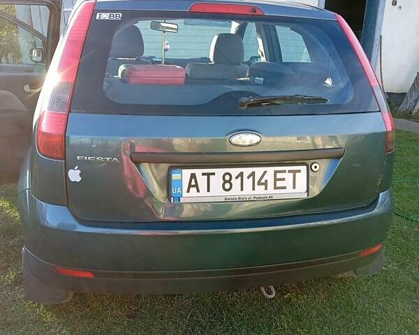 Зеленый Форд Фиеста, объемом двигателя 1.39 л и пробегом 221 тыс. км за 3300 $, фото 4 на Automoto.ua