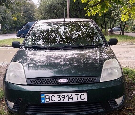 Зеленый Форд Фиеста, объемом двигателя 1.4 л и пробегом 270 тыс. км за 2500 $, фото 5 на Automoto.ua