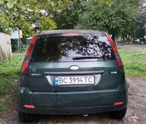 Зеленый Форд Фиеста, объемом двигателя 1.4 л и пробегом 270 тыс. км за 2500 $, фото 7 на Automoto.ua