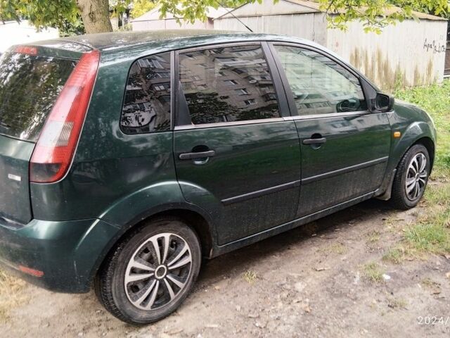 Зеленый Форд Фиеста, объемом двигателя 1.4 л и пробегом 270 тыс. км за 2500 $, фото 6 на Automoto.ua