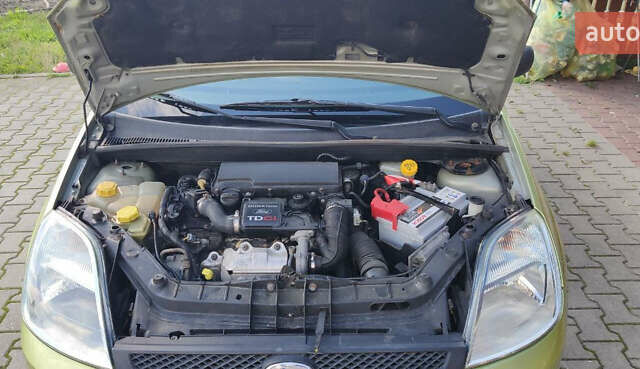 Зеленый Форд Фиеста, объемом двигателя 1.4 л и пробегом 212 тыс. км за 4000 $, фото 11 на Automoto.ua