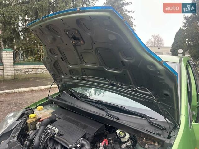 Зеленый Форд Фиеста, объемом двигателя 1.4 л и пробегом 125 тыс. км за 4999 $, фото 11 на Automoto.ua