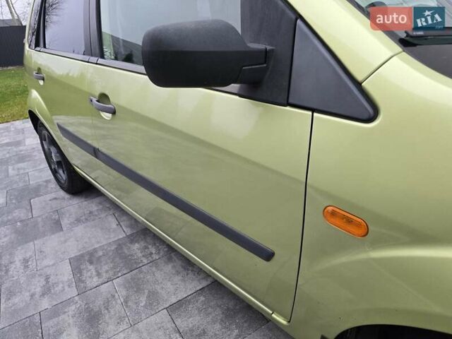 Зеленый Форд Фиеста, объемом двигателя 1.4 л и пробегом 213 тыс. км за 3800 $, фото 54 на Automoto.ua