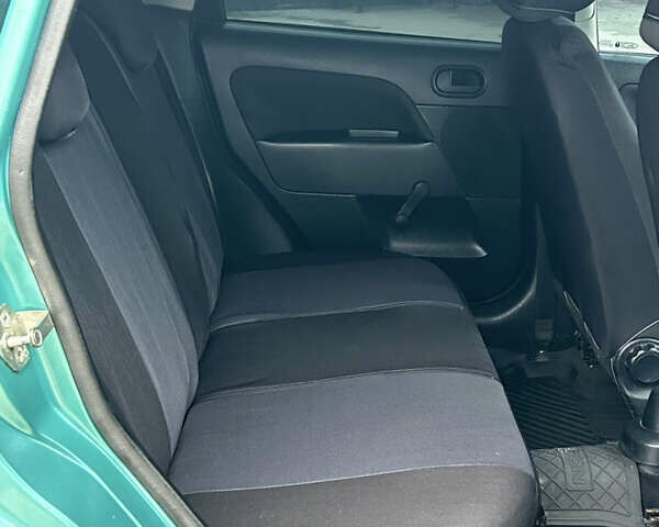 Зеленый Форд Фиеста, объемом двигателя 1.3 л и пробегом 235 тыс. км за 3700 $, фото 12 на Automoto.ua