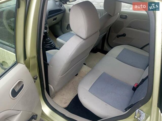 Зеленый Форд Фиеста, объемом двигателя 1.25 л и пробегом 268 тыс. км за 2899 $, фото 7 на Automoto.ua