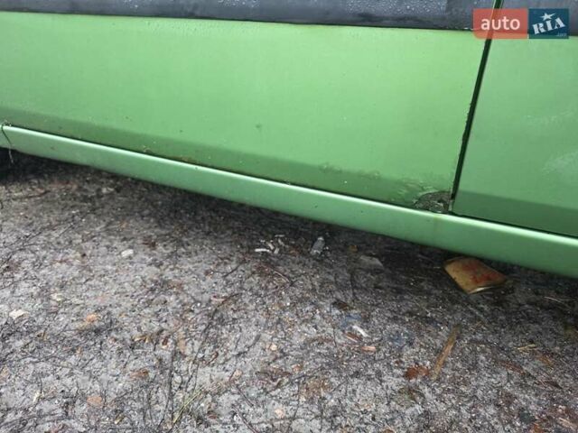 Зеленый Форд Фиеста, объемом двигателя 1.39 л и пробегом 182 тыс. км за 3000 $, фото 14 на Automoto.ua