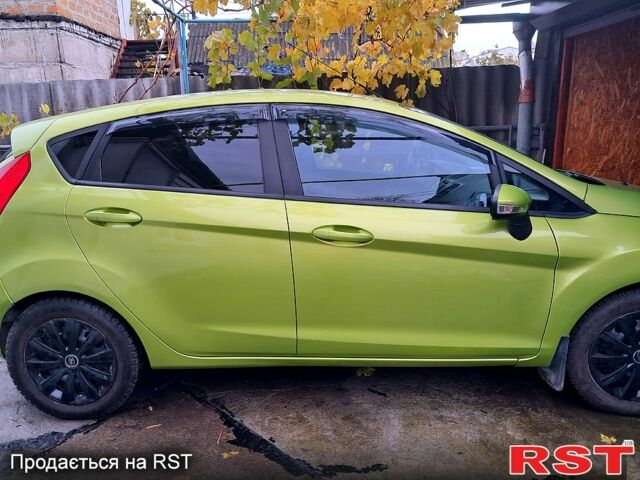 Зеленый Форд Фиеста, объемом двигателя 1.4 л и пробегом 167 тыс. км за 7500 $, фото 2 на Automoto.ua
