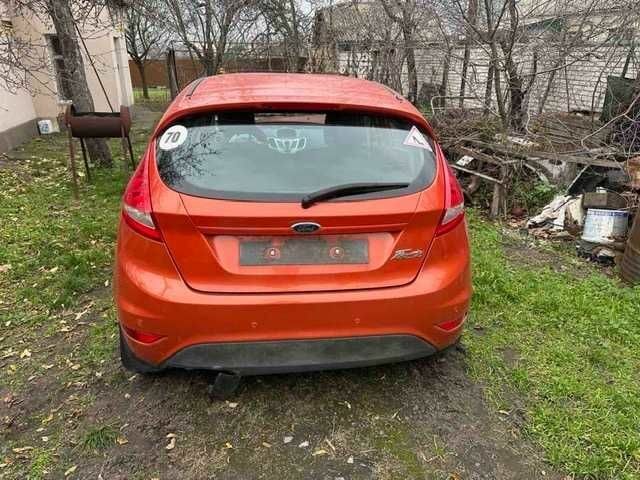 Оранжевый Форд Фиеста, объемом двигателя 1.4 л и пробегом 84 тыс. км за 3790 $, фото 4 на Automoto.ua