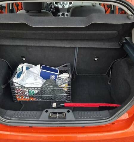 Оранжевый Форд Фиеста, объемом двигателя 1.4 л и пробегом 130 тыс. км за 6700 $, фото 11 на Automoto.ua