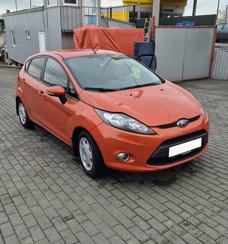Оранжевый Форд Фиеста, объемом двигателя 1.4 л и пробегом 130 тыс. км за 6700 $, фото 7 на Automoto.ua
