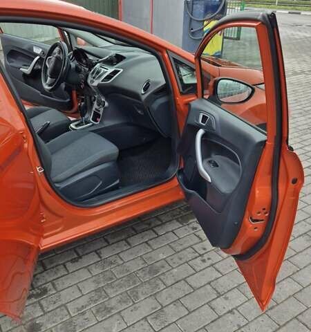 Оранжевый Форд Фиеста, объемом двигателя 1.4 л и пробегом 130 тыс. км за 6700 $, фото 17 на Automoto.ua