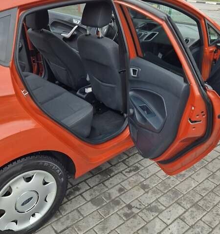 Оранжевый Форд Фиеста, объемом двигателя 1.4 л и пробегом 130 тыс. км за 6700 $, фото 15 на Automoto.ua