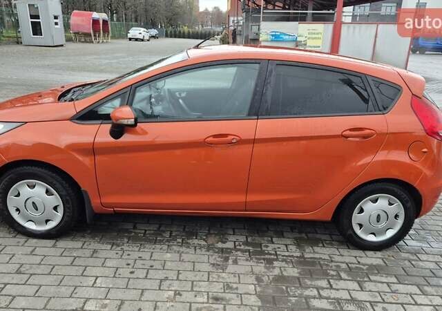 Оранжевый Форд Фиеста, объемом двигателя 1.4 л и пробегом 130 тыс. км за 6700 $, фото 5 на Automoto.ua