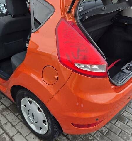 Оранжевый Форд Фиеста, объемом двигателя 1.4 л и пробегом 130 тыс. км за 6700 $, фото 12 на Automoto.ua