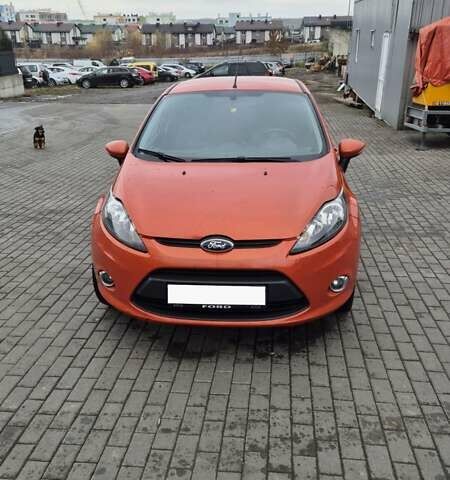 Оранжевый Форд Фиеста, объемом двигателя 1.4 л и пробегом 130 тыс. км за 6700 $, фото 4 на Automoto.ua