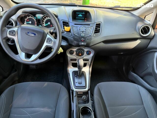 Оранжевый Форд Фиеста, объемом двигателя 1.6 л и пробегом 54 тыс. км за 9790 $, фото 16 на Automoto.ua