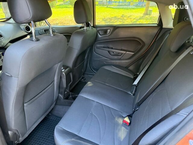 Оранжевый Форд Фиеста, объемом двигателя 1.6 л и пробегом 54 тыс. км за 9790 $, фото 15 на Automoto.ua