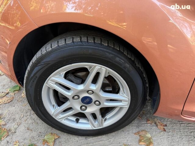 Оранжевый Форд Фиеста, объемом двигателя 1.6 л и пробегом 54 тыс. км за 9790 $, фото 9 на Automoto.ua