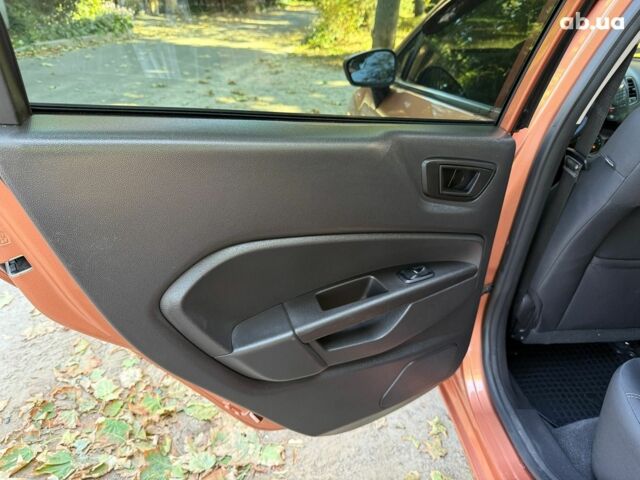 Оранжевый Форд Фиеста, объемом двигателя 1.6 л и пробегом 54 тыс. км за 9790 $, фото 14 на Automoto.ua