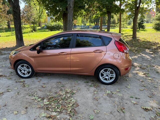 Оранжевый Форд Фиеста, объемом двигателя 1.6 л и пробегом 54 тыс. км за 9790 $, фото 8 на Automoto.ua