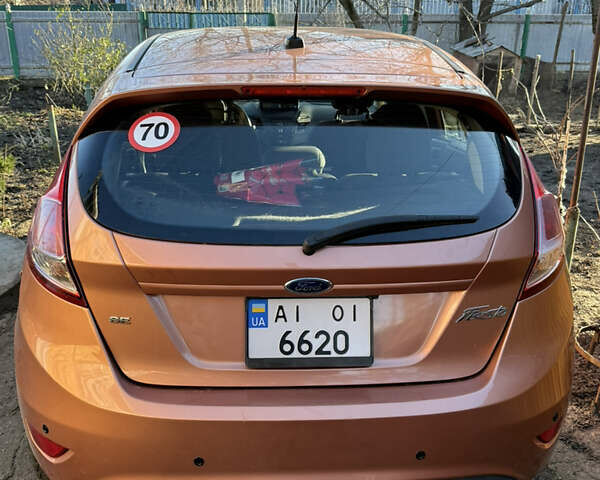 Помаранчевий Форд Фієста, об'ємом двигуна 1.6 л та пробігом 130 тис. км за 5200 $, фото 2 на Automoto.ua