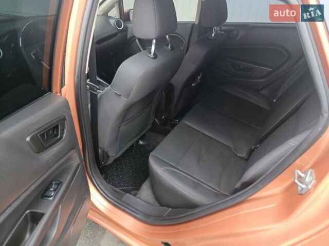 Оранжевый Форд Фиеста, объемом двигателя 1.6 л и пробегом 144 тыс. км за 7999 $, фото 15 на Automoto.ua