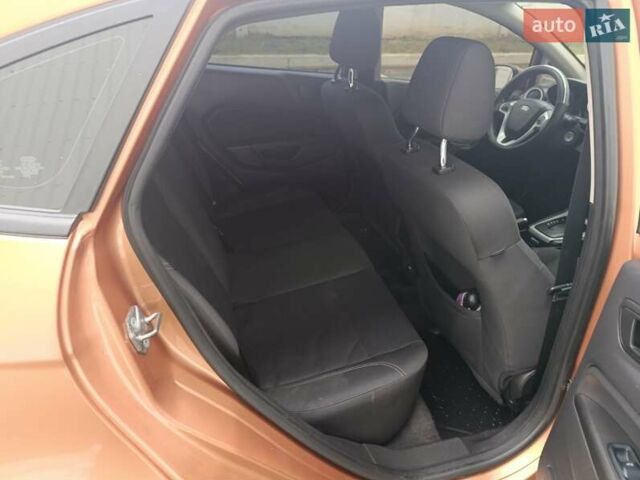 Оранжевый Форд Фиеста, объемом двигателя 1.6 л и пробегом 144 тыс. км за 7999 $, фото 18 на Automoto.ua