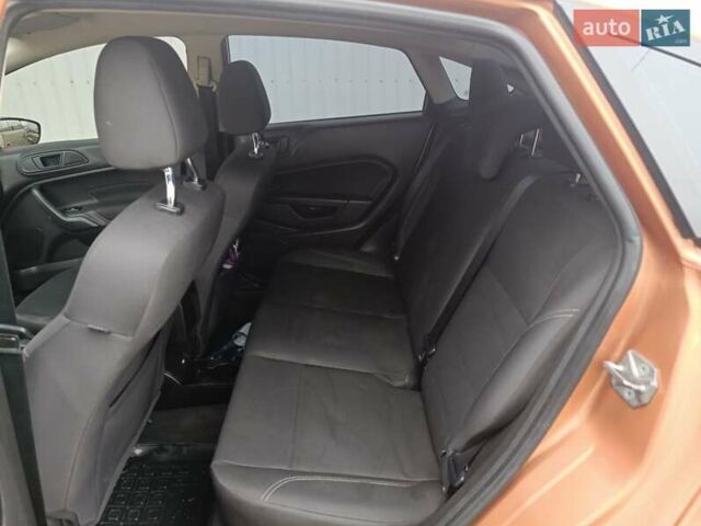 Оранжевый Форд Фиеста, объемом двигателя 1.6 л и пробегом 144 тыс. км за 7999 $, фото 16 на Automoto.ua