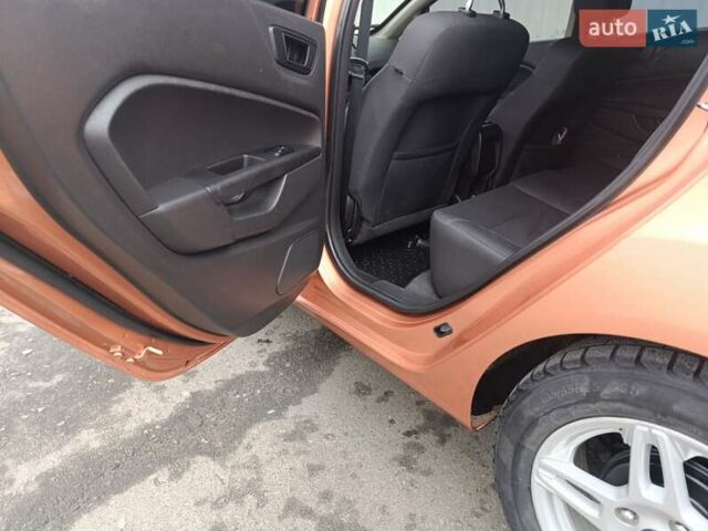 Оранжевый Форд Фиеста, объемом двигателя 1.6 л и пробегом 144 тыс. км за 7999 $, фото 17 на Automoto.ua