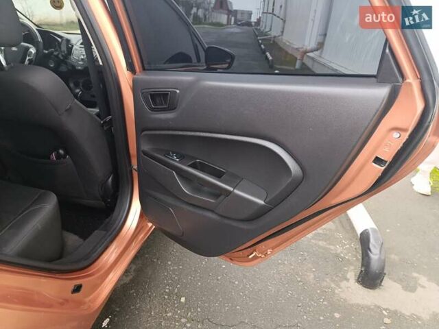 Оранжевый Форд Фиеста, объемом двигателя 1.6 л и пробегом 144 тыс. км за 7999 $, фото 19 на Automoto.ua