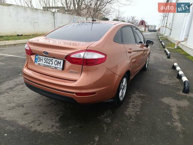 Оранжевый Форд Фиеста, объемом двигателя 1.6 л и пробегом 144 тыс. км за 7999 $, фото 6 на Automoto.ua