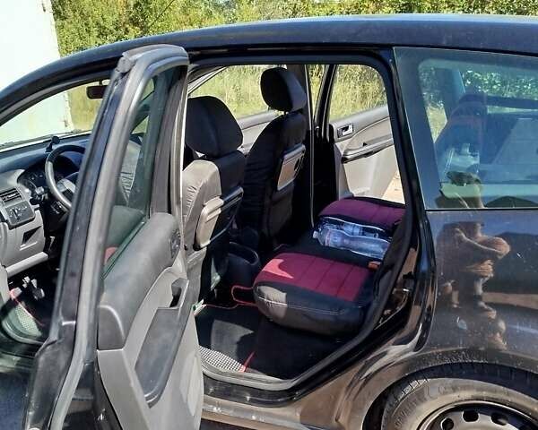 Черный Форд Focus C-Max, объемом двигателя 1.8 л и пробегом 213 тыс. км за 4000 $, фото 2 на Automoto.ua