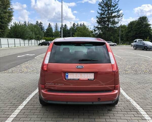 Красный Форд Focus C-Max, объемом двигателя 1.8 л и пробегом 218 тыс. км за 4000 $, фото 9 на Automoto.ua