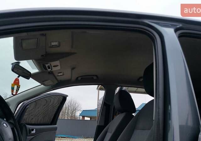 Сірий Форд Focus C-Max, об'ємом двигуна 1.8 л та пробігом 317 тис. км за 4400 $, фото 24 на Automoto.ua
