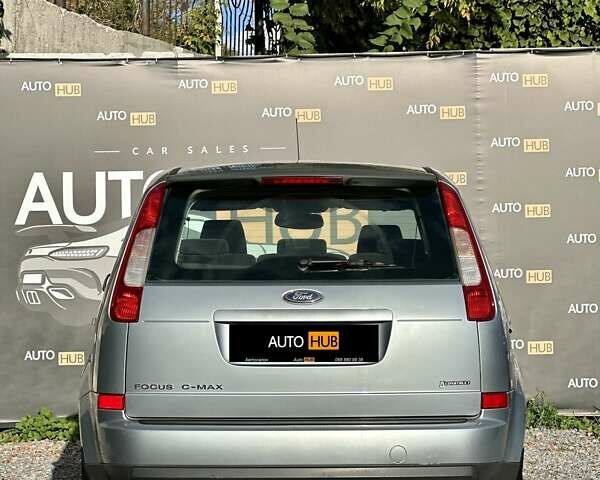 Серый Форд Focus C-Max, объемом двигателя 1.8 л и пробегом 118 тыс. км за 5000 $, фото 4 на Automoto.ua